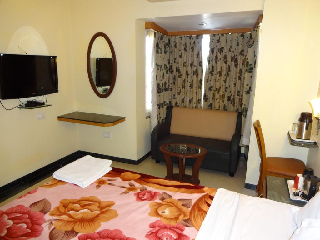 Hotel Nahar Manchester Inn Coimbatore Quarto foto
